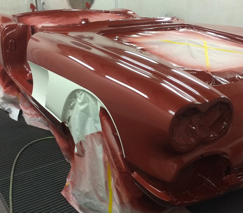 red 1961 corvette freshly painted